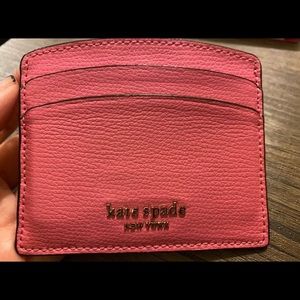Card holder, minimal wear. In great condition.